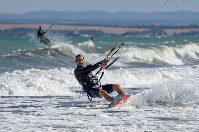 Waves crashing against the shore, symbolizing extreme sports adventure